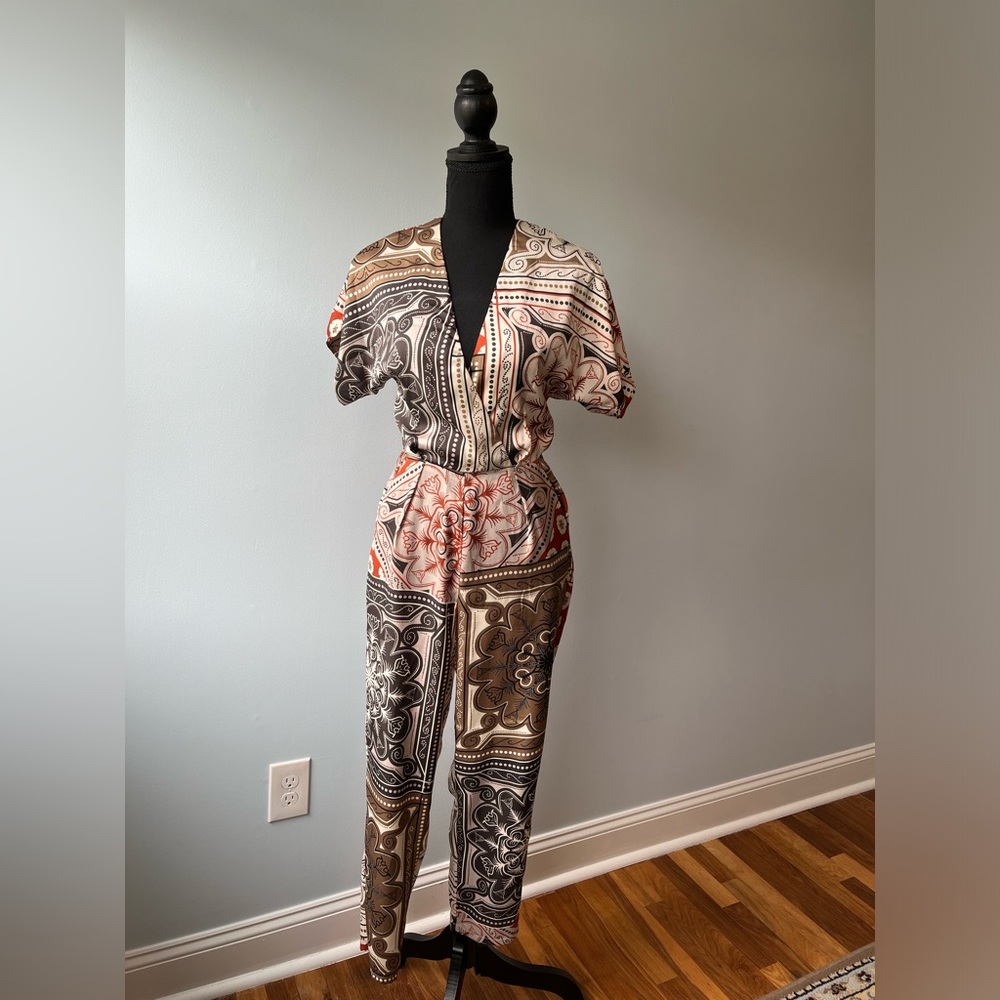 Jumpsuit for woman size XS in very good condition Brand Motivi